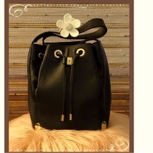 Vince Camuto Janet Drawstring Black leather Tote.  Size: 8.5"L × 6"W × 10"H |